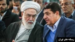 محمد مخبر در کنار گلپایگانی رئیس دفتر علی خامنه‌ای رهبر جمهوری اسلامی ایران.