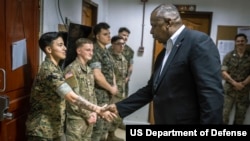 Secretary of Defense Lloyd J. Austin III greets service members assigned to Camp Navarro, Zamboanga, Philippines, Feb. 1, 2023.