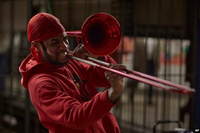 A man plays a wind instrument inside Union Square station on Tuesday, Jan. 17, 2023, in New York. (AP Photo/Andres Kudacki)