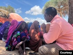 Somali journalist Abdalle Ahmed Mumin is seen out on assignment in Somalia. (Courtesy - Abdalle Ahmed Mumin)