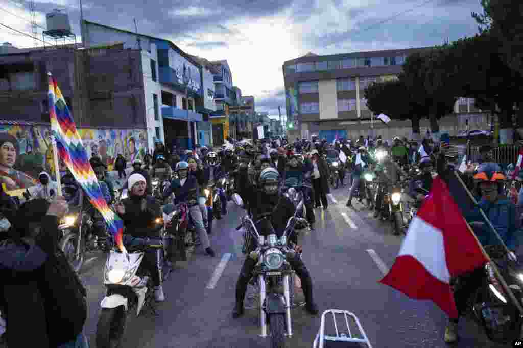 Anti-government demonstrators participate in a motorcycle caravan in Juliaca, Peru, Jan. 30, 2023.&nbsp;The protesters are seeking immediate elections, President Dina Boluarte&#39;s resignation, closure of the Congress and the release of former president Pedro Castillo, who was ousted and arrested for trying to dissolve Congress in December.