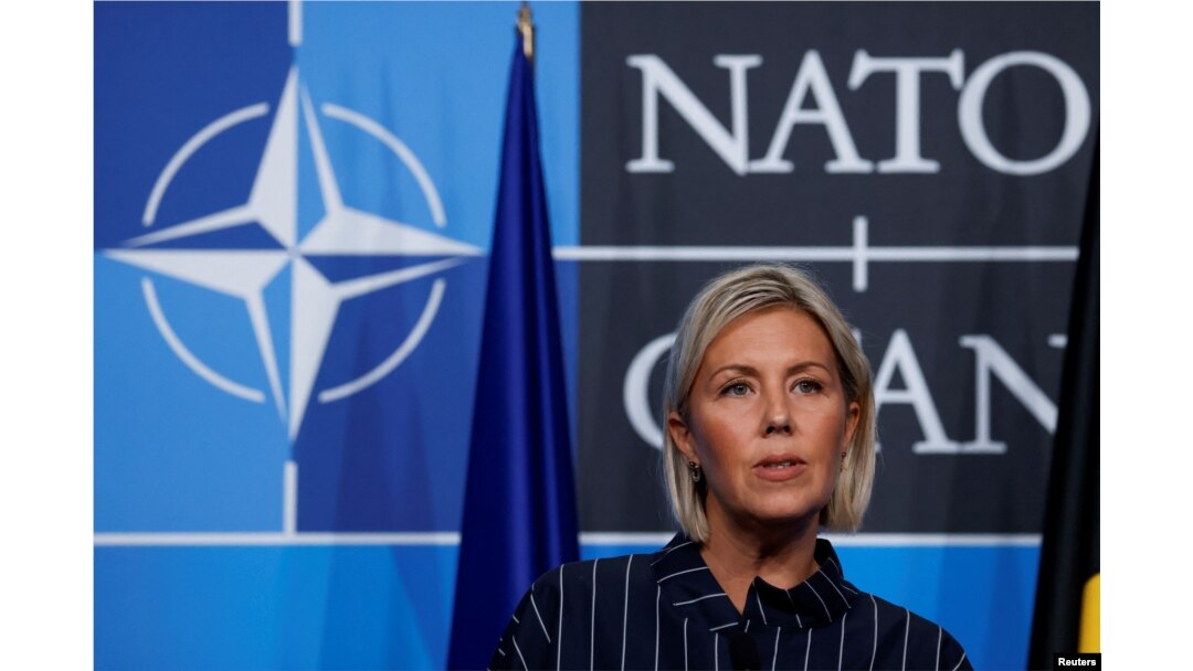 FILE - Belgium's Defense Minister Ludivine Dedonder speaks at a news conference in Madrid, Spain, June 30, 2022.
