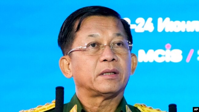 FILE - Commander-in-Chief of Myanmar's armed forces, Senior Gen. Min Aung Hlaing delivers his speech at the IX Moscow conference on international security in Moscow, Russia, June 23, 2021.