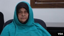 Merika Boudouaia, 50, a French widow who traveled with her husband to Syria in 2014, says she deeply regrets bringing her children to Syria on Oct. 19, 2021, in al-Roj camp, Syria. (Ali Zeyno/VOA)