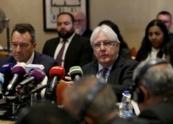 United Nations Special Envoy to Yemen Martin Griffiths, center, and President of the International Committee of the Red Cross Peter Maurer, participate in a new round of talks by Yemen's warring parties in Amman, Jordan, Feb. 5, 2020.