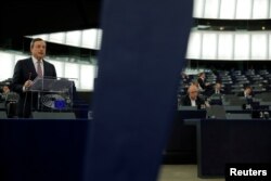European Central Bank (ECB) President Mario Draghi delivers a speech during a debate on the ECB annual report for 2016 at the European Parliament in Strasbourg, France, Feb. 5, 2018.