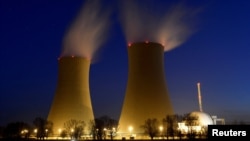 FILE - An extended-exposure photo shows the nuclear power plant in Grohnde, Germany, March 5, 2013. Nations attending a summit on March 21, 2024, in Brussels vowed to increase nuclear energy production as one way to curb climate change.