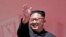 FILE - In this Sept. 9, 2018, photo, North Korean leader Kim Jong Un waves after a parade for the 70th anniversary of North Korea's founding day in Pyongyang, North Korea. 