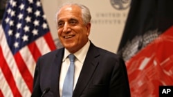 Special Representative for Afghanistan Reconciliation Zalmay Khalilzad approaches the microphone to speak on the prospects for peace, Feb. 8, 2019, at the U.S. Institute of Peace, in Washington. 