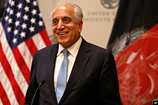 Special Representative for Afghanistan Reconciliation Zalmay Khalilzad approaches the microphone to speak on the prospects for peace, Feb. 8, 2019, at the U.S. Institute of Peace, in Washington.