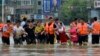 Banjir dan Tanah Longsor di China Barat Kubur 40 Orang