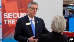 Georgia Secretary of State Brad Raffensperger attends a conference of local election officials in Savannah, Georgia, Dec. 11, 2019. 