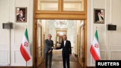 File - Iran's Deputy Foreign Minister and Chief Nuclear Negotiator Ali Bagheri Kani meets with Deputy Secretary General of the European External Action Service (EEAS), Enrique Mora, in Tehran, Iran, May 11, 2022.