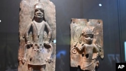 Benin bronzes objects are displayed at the Linden Museum in Stuttgart, Germany, June 29, 2022. (Bernd Weissbrod/dpa via AP, File)