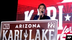 FILE: Kari Lake, Republican candidate for Arizona governor, speaks at her primary election night party, Aug. 2, 2022, in Scottsdale, Arizona.