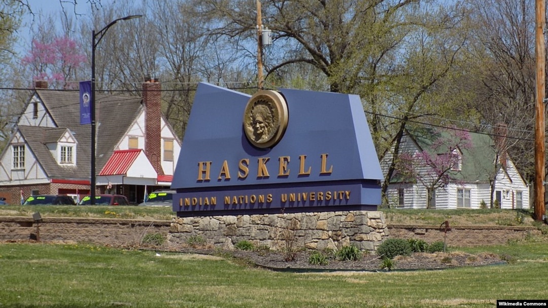Sign at the entrance of Haskell Indian Nations University, a public tribal land-grant university in Lawrence, Kansas, founded in 1884.