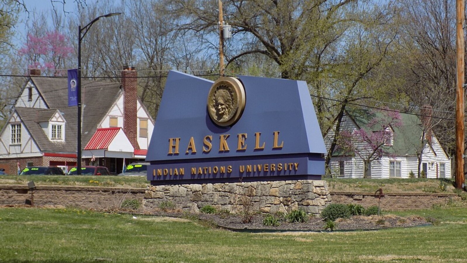Sign at the entrance of Haskell Indian Nations University, a public tribal land-grant university in Lawrence, Kansas, founded in 1884.