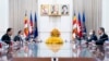 Secretary of State Antony Blinken, right, meets with Cambodian Prime Minister Hun Sen, left, at the Peace Palace in Phnom Penh, Cambodia, Aug. 4, 2022.