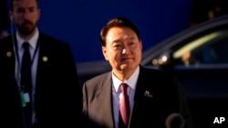 FILE - South Korea's President Yoon Suk Yeol arrives for the NATO summit in Madrid, Spain, on June 30, 2022.