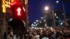 FILE - Journalists gather during a protest by the Group for Media Freedom in front of the government headquarters in Belgrade, Serbia, Oct. 16, 2019. Group for Media Freedom says journalists endure daily insults, pressures, vilifications and threats.