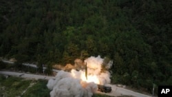 A projectile is launched at an unspecified location in China during long-range live-fire drills by the rocket force of the Eastern Theater Command of the Chinese People's Liberation Army targeting maritime areas east of Taiwan, Thursday, Aug. 4, 2022. 