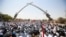 FILE - Followers of Shiite cleric Muqtada al-Sadr gather during open-air Friday prayers at Grand Festivities Square in Baghdad, Iraq, Aug. 5, 2022. 