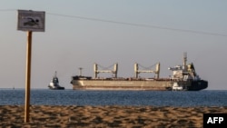 The Malta-flagged bulk carrier M/V Rojen, carrying tons of corn, leaves the Ukrainian port of Chornomorsk, before heading to Teesport in the United Kingdom, Aug. 5, 2022, amid the Russian invasion of Ukraine.
