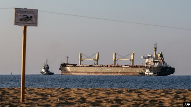 The Malta-flagged bulk carrier M/V Rojen, carrying tons of corn, leaves the Ukrainian port of Chornomorsk, before heading to Teesport in the United Kingdom, Aug. 5, 2022, amid the Russian invasion of Ukraine.