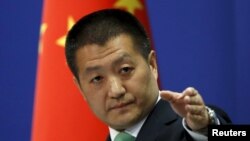 Le porte-parole du ministère chinois des Affaires étrangères Lu Kang lors d'une conférence de presse régulière à Pékin , le 27 octobre 2015.