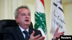 FILE - Then-Lebanonese central bank Governor Riad Salameh speaks during an interview in Beirut, Lebanon, on Nov. 23, 2021. Salemeh was detained on Sept. 3, 2024, and is being questioned in corruption cases.