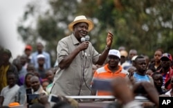 Kenyan opposition leader Raila Odinga addresses a crowd of his supporters in the Kibera area of Nairobi, Kenya, Sept. 2, 2017.