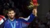 Russian Wrestler Returns Gold Medal in Protest
