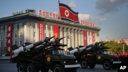 FILE - North Korean soldiers parade through Kim Il Sung Square with their missiles and rockets during a mass military parade, Oct. 10, 2015, in Pyongyang, North Korea. 