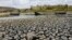 FILE - Aground boats are seen at the almost dried lagoon Las Playitas in Ciudad Dario, Matagalpa some 70 km from Managua on March 31, 2016.