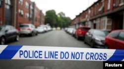Police cordon off the road in Rusholme, Manchester, Britain June 2, 2017. 