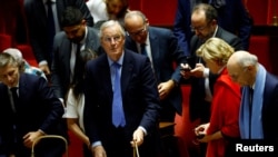 French Prime Minister Michel Barnier reacts after the result of the vote on the first motion of no-confidence against the French government, at the National Assembly in Paris, France, December 4, 2024. 