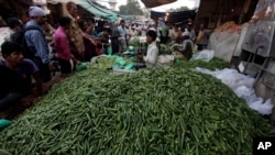 Un marché en Inde, où faute d'infrastructures, les pertes alimentaires sont considérables (AP)