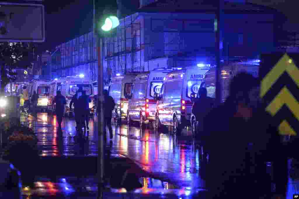 Ambulances wait near the scene of an attack in Istanbul, early Jan. 1, 2017.