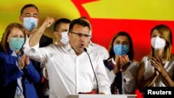 North Macedonian former prime minister and leader of the ruling SDSM party Zoran Zaev celebrates his victory in a parliamentary election, after planned snap elections in April had to be postponed due to the coronavirus.