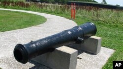 FILE - A Revolutionary War-era gun that was recently brought to Fort Moultrie on Sullivans Island, S.C., is seen on Friday, June 27, 2014.