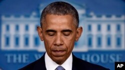 President Barack Obama pauses as he speaks in the Brady Press Briefing Room of the White House in Washington, April 23, 2015. 