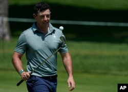 Ireland's Rory McIlroy practices at the 2020 Summer Olympics, July 27, 2021, at the Kasumigaseki Country Club in Kawagoe, Japan.