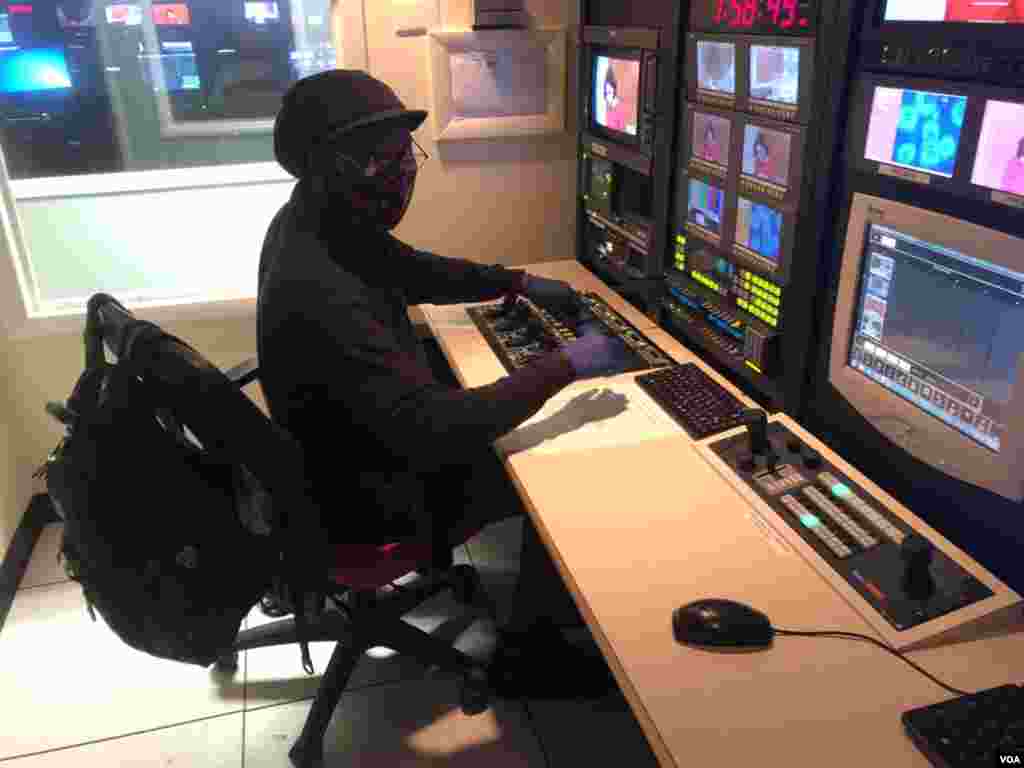 VOA&#39;s Darrel Mitchell mans the controls in the camera studio. 