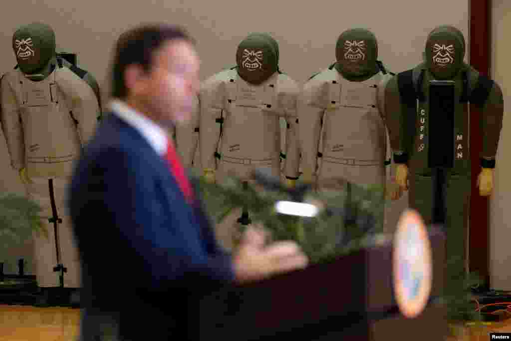 Training dummies are seen as Florida Governor Ron DeSantis speaks during a press conference announcing that Florida law enforcement will launch a criminal investigation of the apparent assassination attempt on Republican presidential nominee and former U.S. President Donald Trump, in West Palm Beach, Florida.