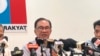 Malaysian opposition leader Anwar Ibrahim speaks during a press conference at his party headquarters in Petaling Jaya, Malaysia, Thursday, Oct. 13, 2022.