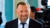 FILE - Russian metals magnate Oleg Deripaska attends a meeting of Russian President Vladimir Putin and Turkish President Recep Tayyip Erdogan, outside St. Petersburg, Russia, Aug. 9, 2016. 