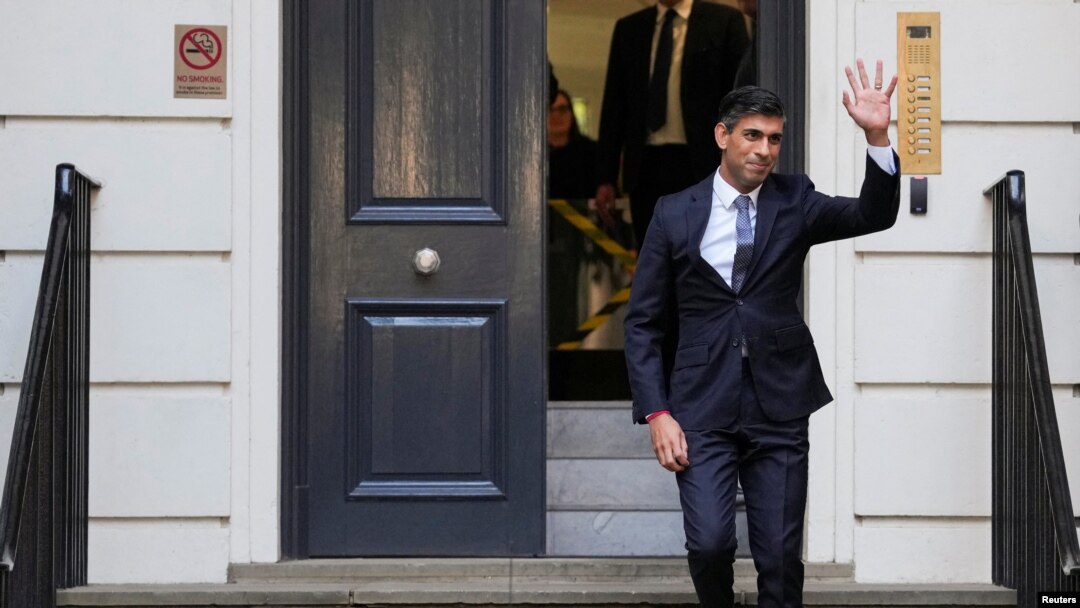 New leader of the Britain's Conservative Party Rishi Sunak walks outside the Conservative Campaign Headquarters, in London, Oct. 24, 2022. 