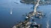 The bridge leading from Fort Myers to Pine Island, Fla., is heavily damaged in the aftermath of Hurricane Ian, Oct. 1, 2022.