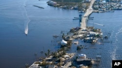 The bridge leading to Pine Island, Fla., is heavily damaged in the aftermath of Hurricane Ian, Oct. 1, 2022.