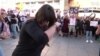 Demonstrator Cuts Hair in Madrid to Protest Iranian Woman’s Death 